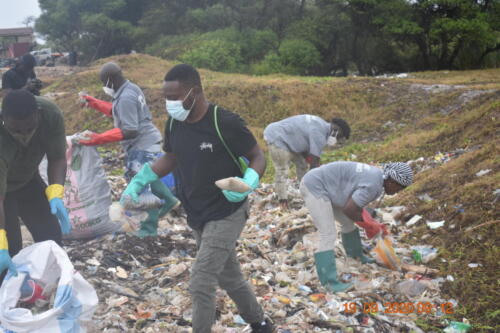 CCO Volunteers busily sorting plastics at Laboma Beach Accra