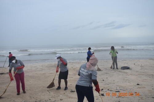 CCO Volunteers engaged in cleaning at the Laboma Beach Accra